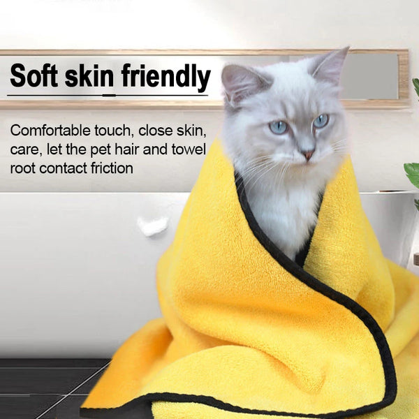 Cat lounging on a plush, absorbent pet towel